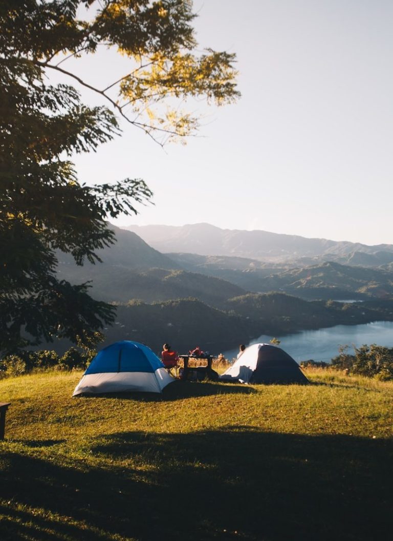 set-up tents near body of water
